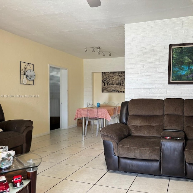 tiled living room with a textured ceiling