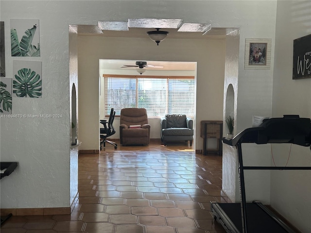 living room with ceiling fan