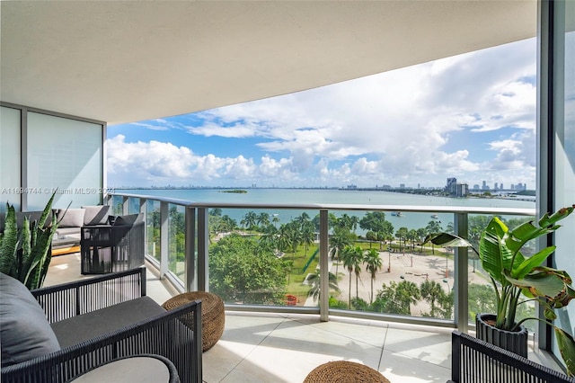 balcony featuring a water view