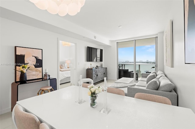 dining room with a water view