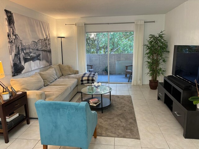 6884 N Kendall Dr Unit C407, Pinecrest, FL 33156 - living area featuring light tile patterned floors
