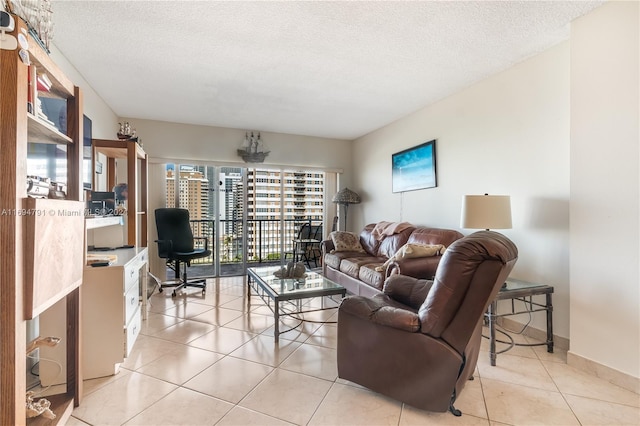 tiled living room with a textured ceiling