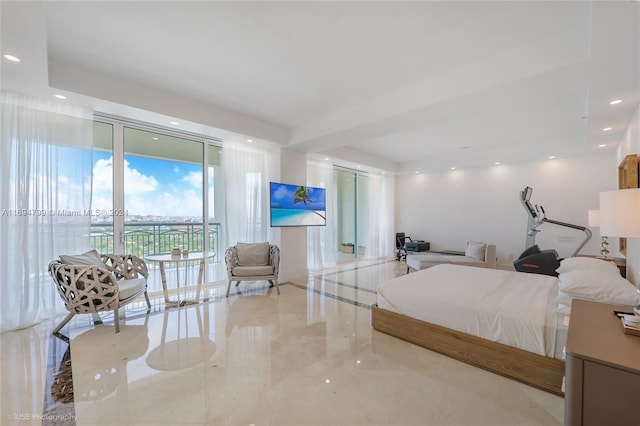 bedroom with access to outside and expansive windows