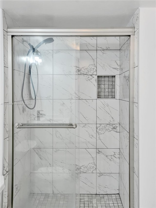 bathroom featuring walk in shower