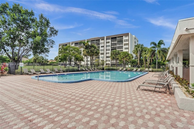 view of swimming pool with a patio area