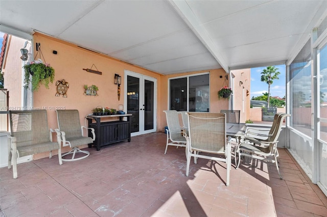 sunroom / solarium with beam ceiling