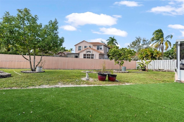 view of yard with fence