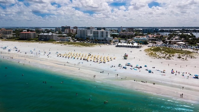 aerial view featuring a water view and a beach view