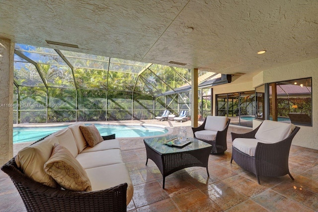 view of patio featuring an outdoor hangout area and a lanai