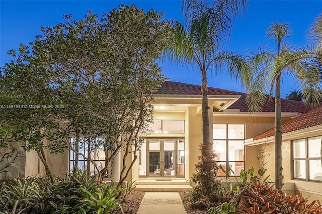 entrance to property with french doors