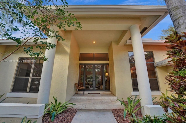 doorway to property featuring french doors