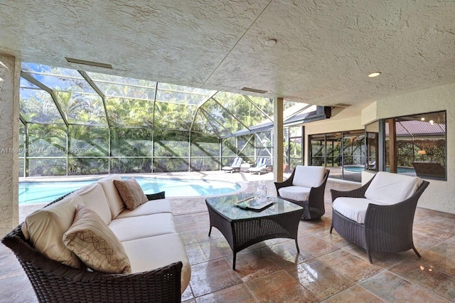 view of patio featuring a lanai and an outdoor hangout area