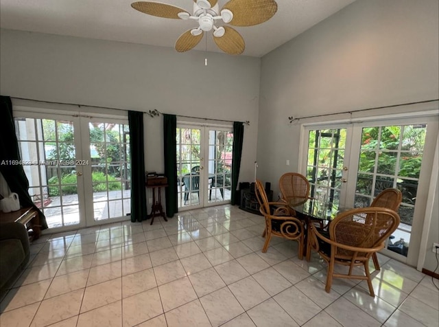 dining area with light tile patterned flooring, french doors, plenty of natural light, and ceiling fan