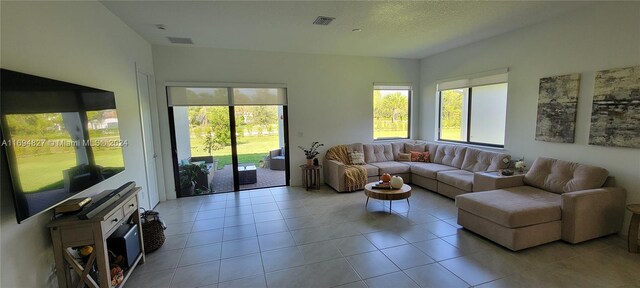 living room with light tile patterned floors