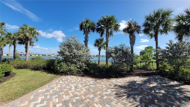 view of patio / terrace with a water view