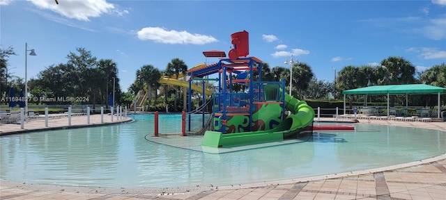 view of play area with a community pool