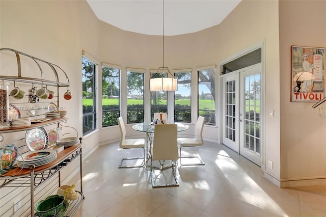 sunroom / solarium with french doors and plenty of natural light