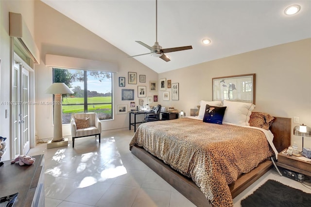 bedroom featuring ceiling fan, light tile patterned floors, and high vaulted ceiling