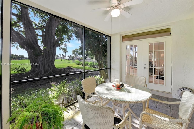 sunroom with french doors and ceiling fan