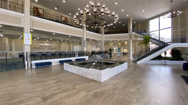 4107 E Cambridge E Unit 4107, Deerfield Beach, FL 33442 - building lobby with a high ceiling and stairs