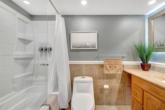 full bathroom featuring tile patterned floors, vanity, toilet, and shower / bathtub combination with curtain