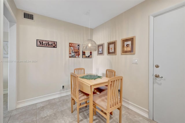 dining room featuring light tile patterned floors