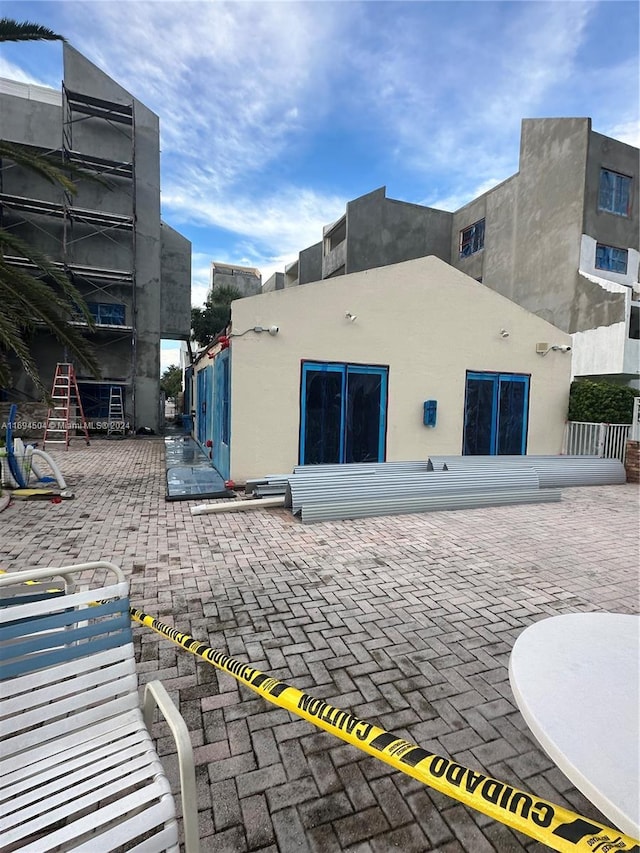 rear view of house featuring a patio area