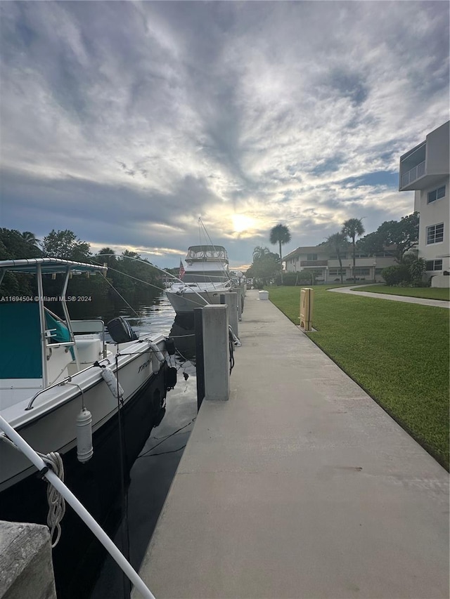 dock area with a yard