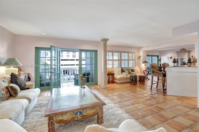 tiled living room with ornate columns