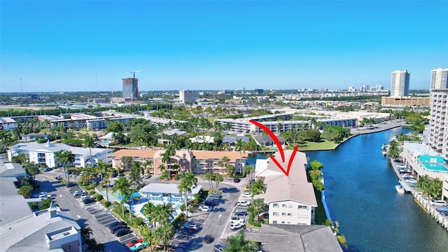 birds eye view of property featuring a water view