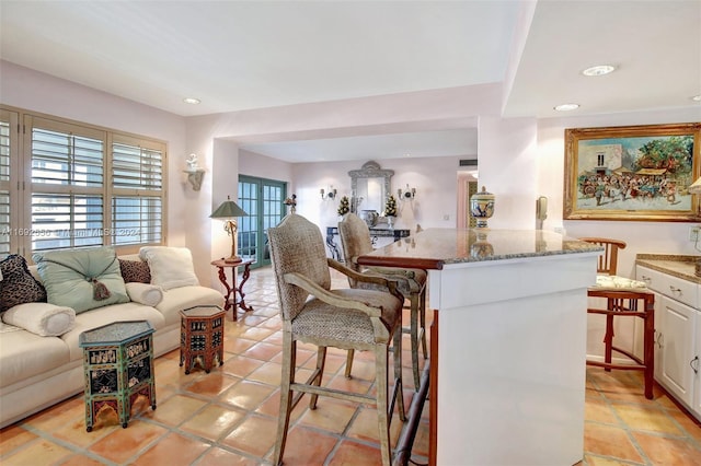 living room featuring light tile patterned floors