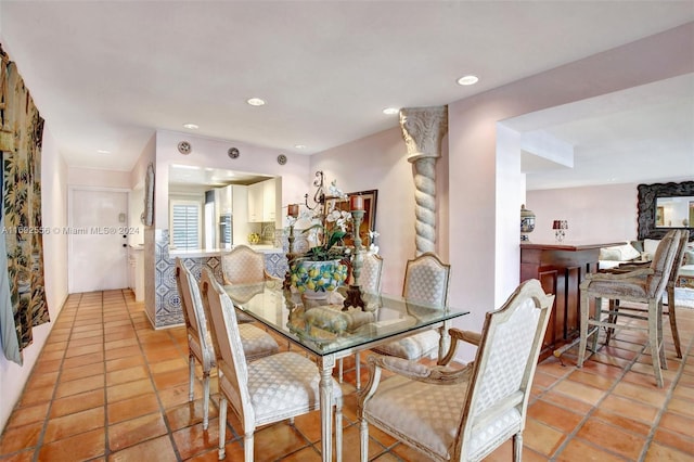 dining room with light tile patterned flooring