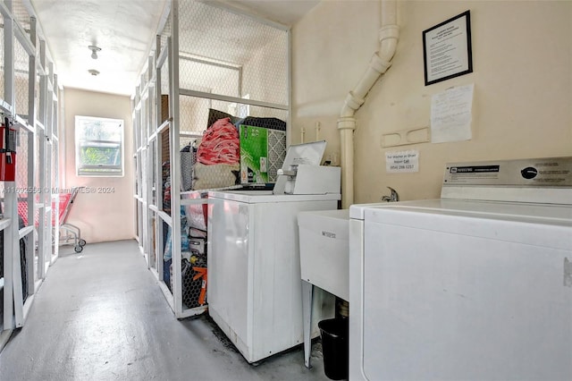 laundry area with washer and clothes dryer