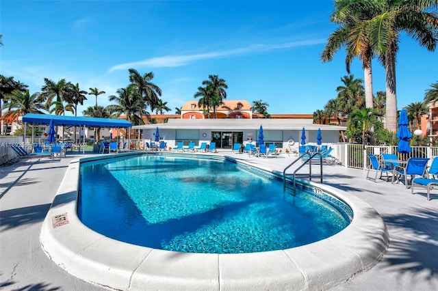 view of swimming pool with a patio