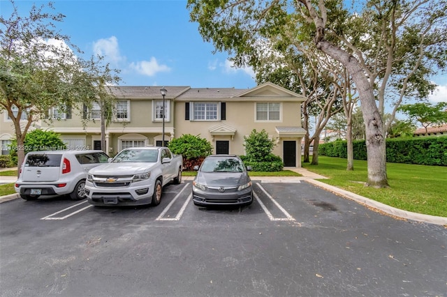 view of front of house with a front lawn