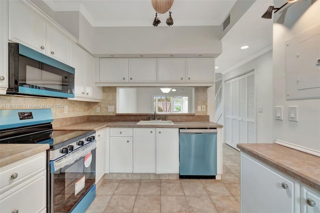 kitchen with white cabinetry, sink, stainless steel appliances, and ornamental molding