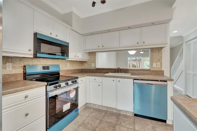 kitchen with black appliances, white cabinets, sink, decorative backsplash, and ornamental molding