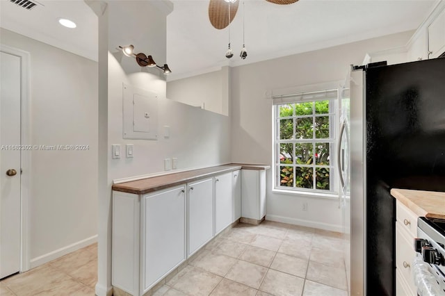 kitchen with ceiling fan, light tile patterned floors, white stove, white cabinetry, and stainless steel refrigerator