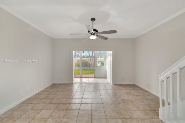 spare room featuring ceiling fan, light tile patterned flooring, and ornamental molding