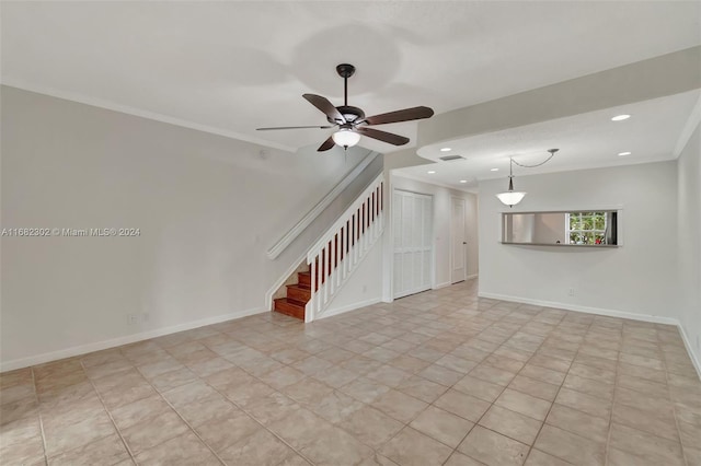 unfurnished living room featuring ceiling fan and crown molding