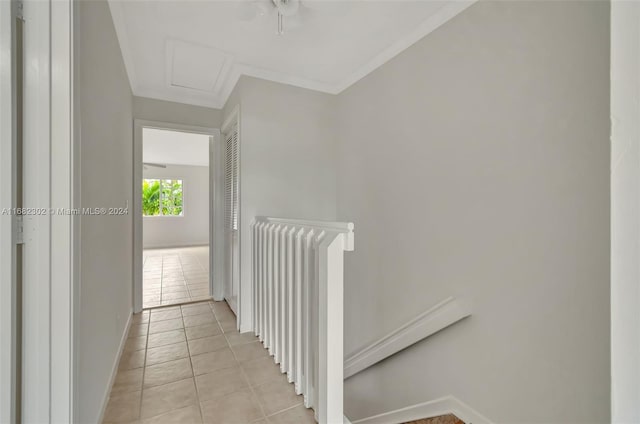 corridor featuring light tile patterned floors