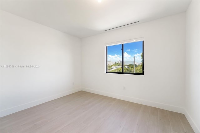 empty room featuring light hardwood / wood-style floors