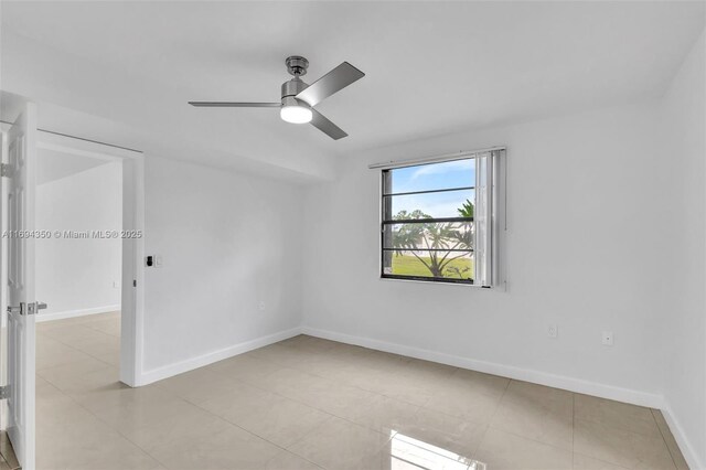 unfurnished living room featuring sink, light tile patterned floors, and an inviting chandelier