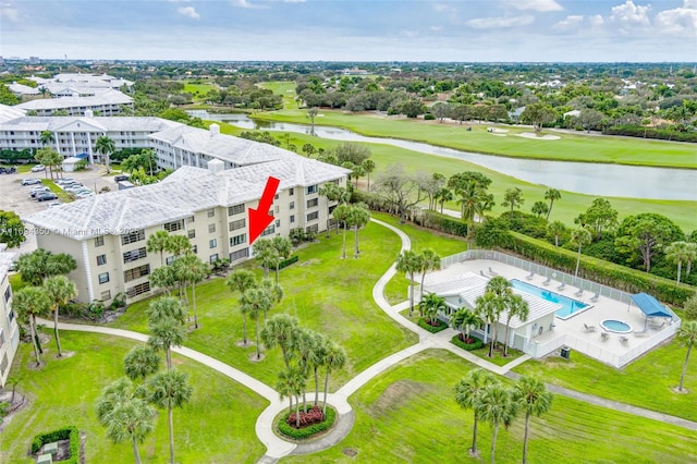 birds eye view of property featuring a water view