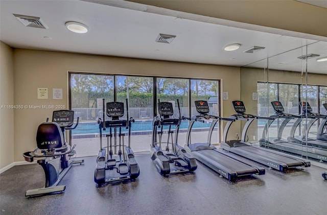 exercise room with plenty of natural light