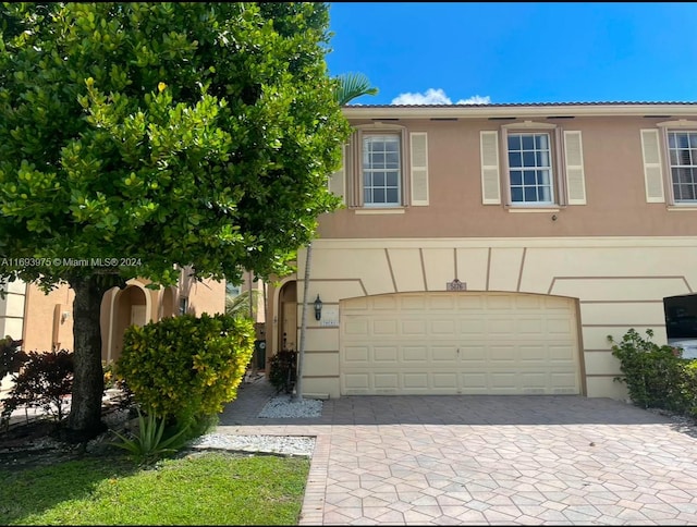 view of front of home with a garage