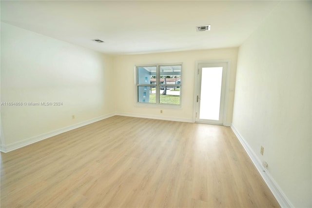 4450 SW 34th Dr, Dania Beach, FL 33312 - unfurnished room featuring light wood-style floors and baseboards