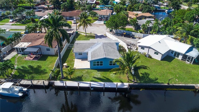 bird's eye view with a water view