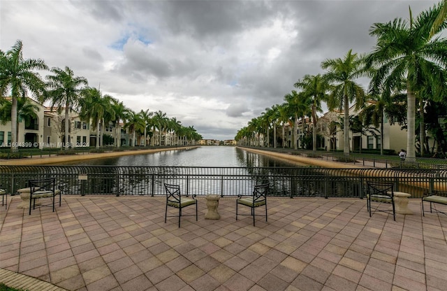 view of patio featuring a water view