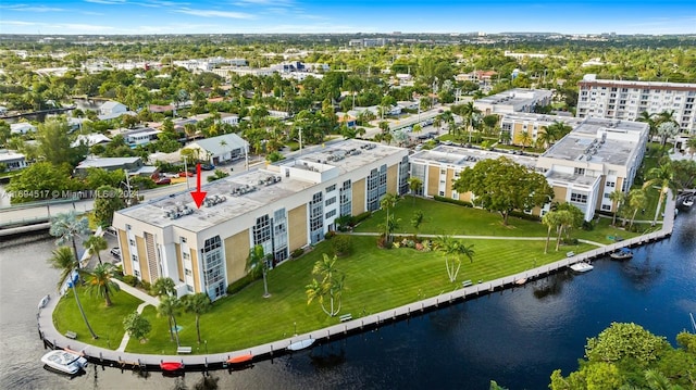 birds eye view of property featuring a water view